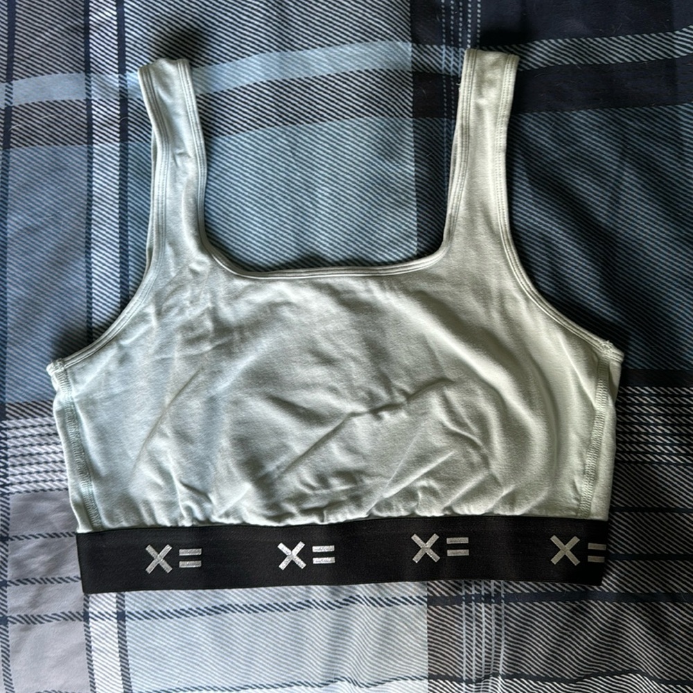 TomboyX soft essentials large bra. Pale mint green.